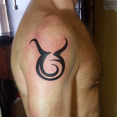 Tattoos for a taurus - Taurus tattoo design ; The general Taurus symbol is drawn as a simple circle with two horns on the sides. It basically represents the head of the bull, as the bull is the symbol of Taurus. However, this simple design is worked upon by creative and innovative people for creating amazing Taurus tattoos.